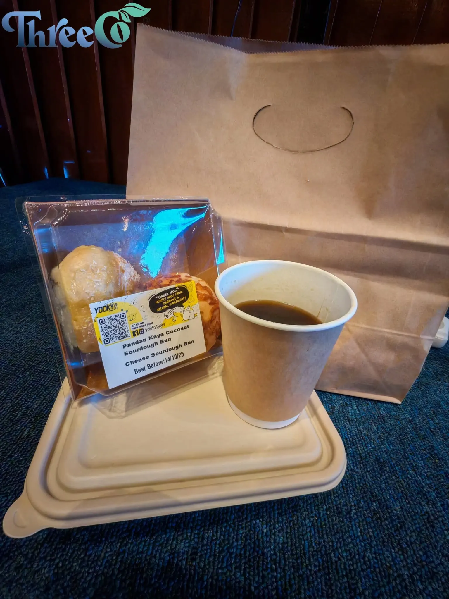 A ThreeCo biodegradable lunch box, kraft paper cup and kraft paper bag used at TEDxPetalingStreet 2025