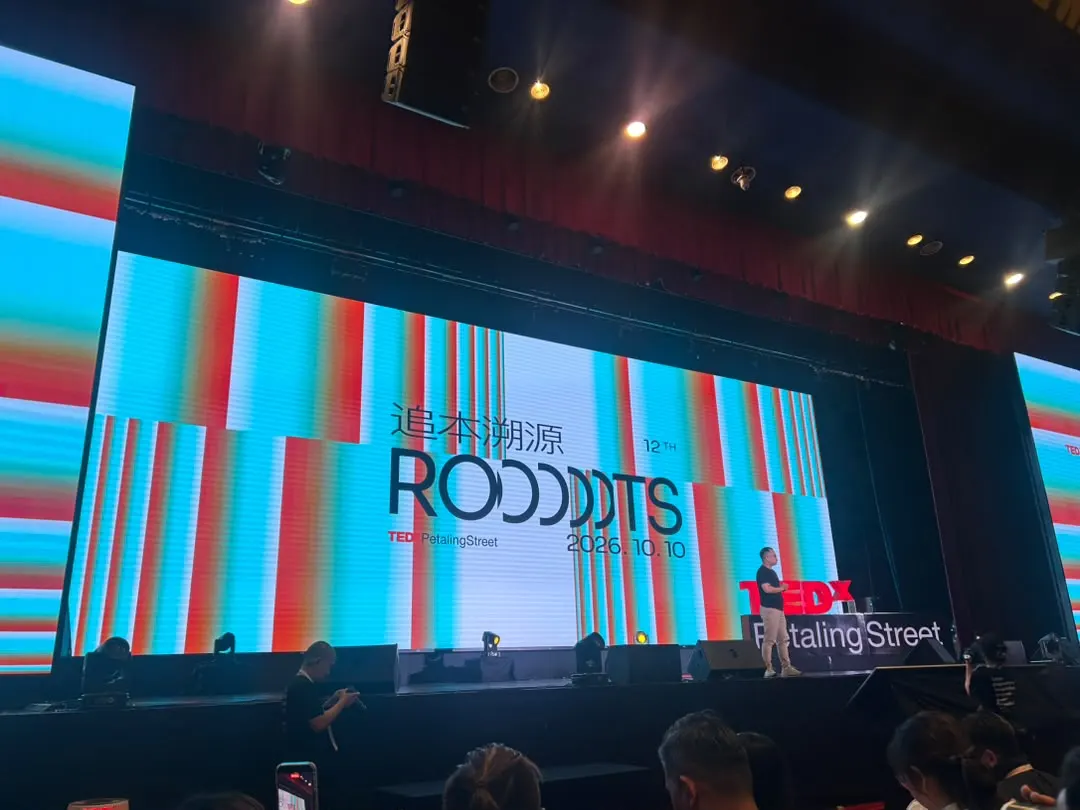 A speaker on stage at TEDxPetalingStreet 2026 “ROOOTS 追本溯源” at Wisma MCA, Kuala Lumpur